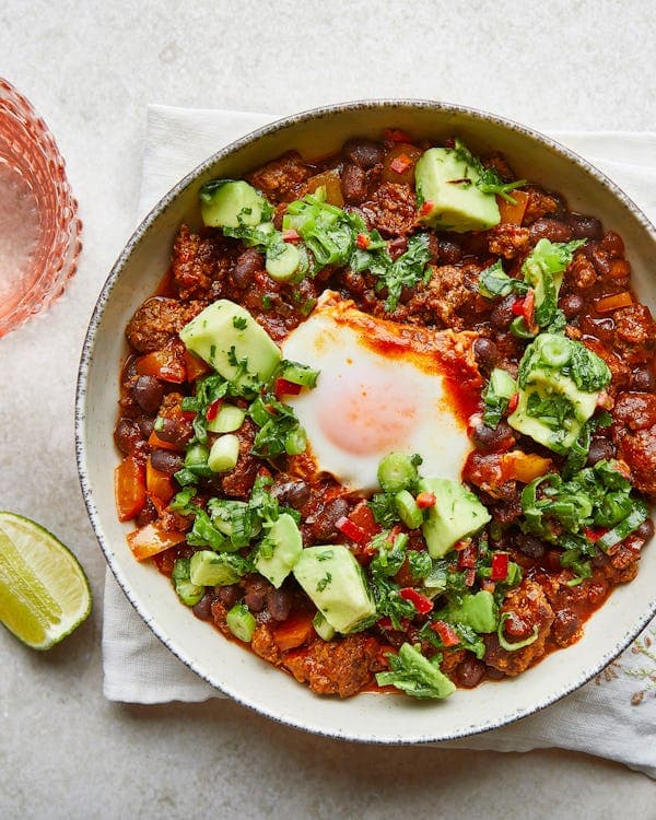 Mexican-style Beef Shakshuka with Black Beans, Avocado Salsa & Gooey Egg